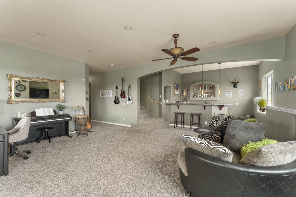 Real Estate photography of a basement in a Castle Rock Home